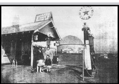 1922 old Texaco-DX station next to the Round Barn